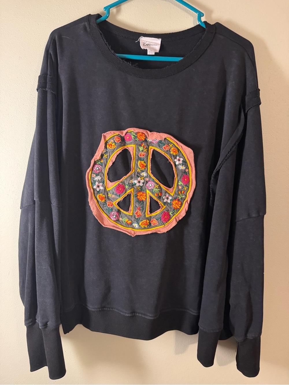 Kori America Black Crewneck Sweatshirt with Pink Floral Peace Patch